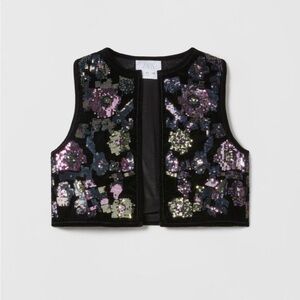 Embellished black “velvet “ vest
Size 13/14 years old
Brand Zara